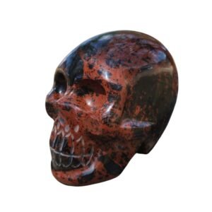 Hand-carved black obsidian skull with red details